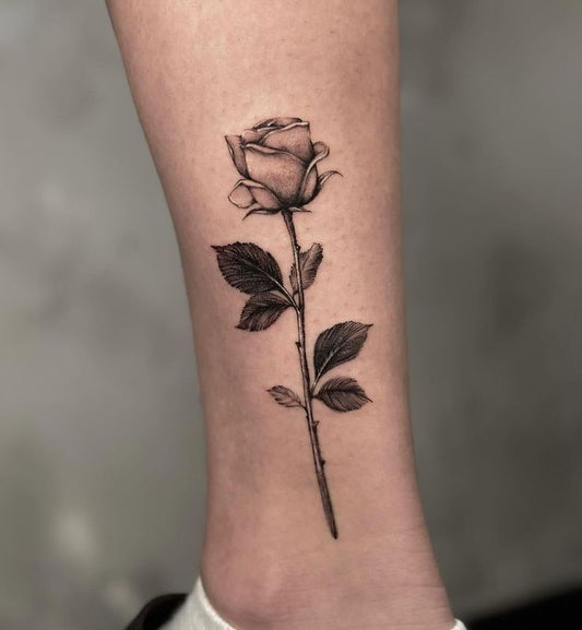 Rose tattoo on Leg