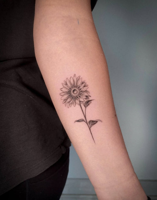 Best fine line flower tattoo in Saskatoon
