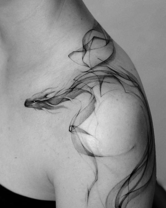 Dragon tattoo meaning through culture, style, and symbolism blog image for tattoo artist selection and portfolio review in Saskatoon